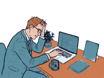 A sales rep slumped over a laptop, working through spreadsheets instead of selling